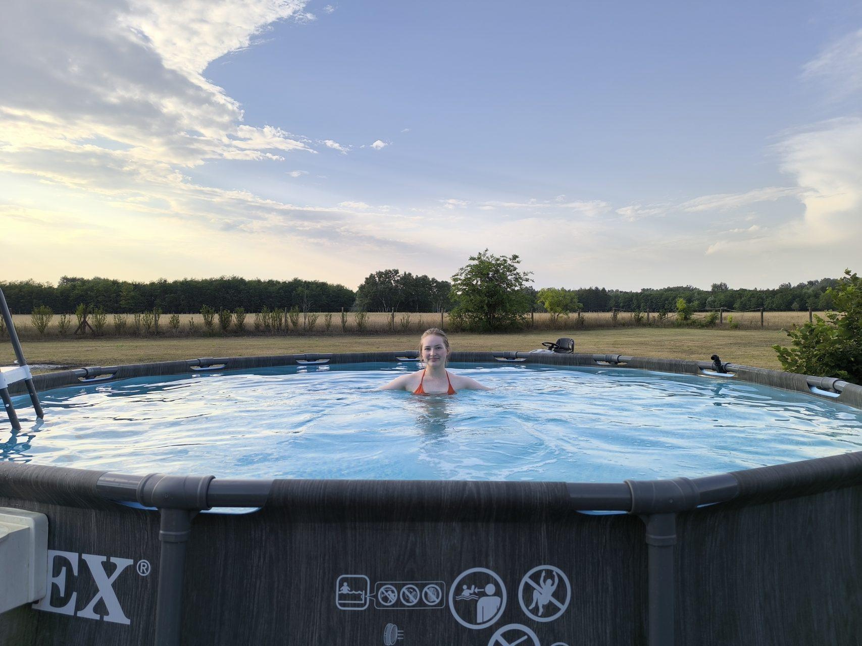 Cooling off in the pool with a view of the endless fields
