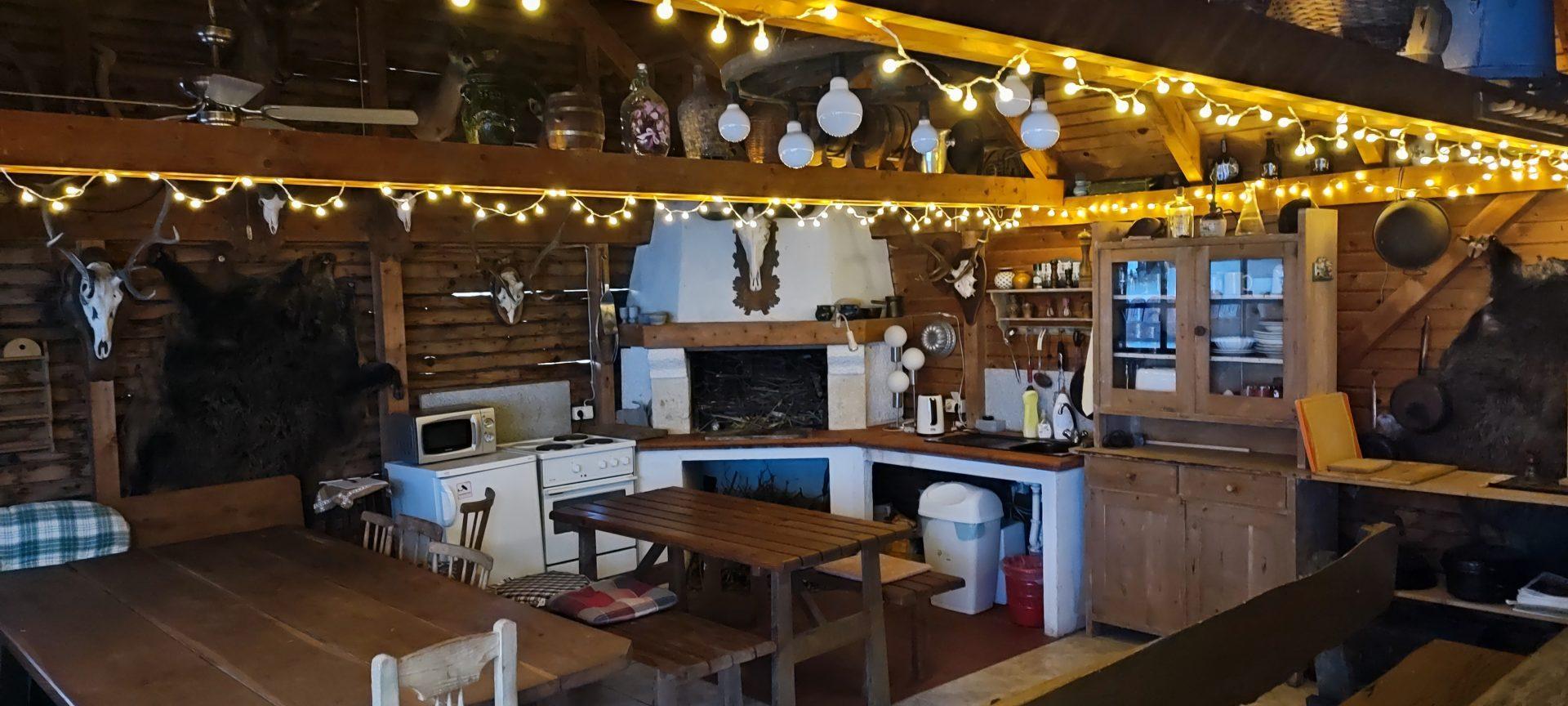 The cozy rustic kitchen with fairy lights, perfect for winter evenings